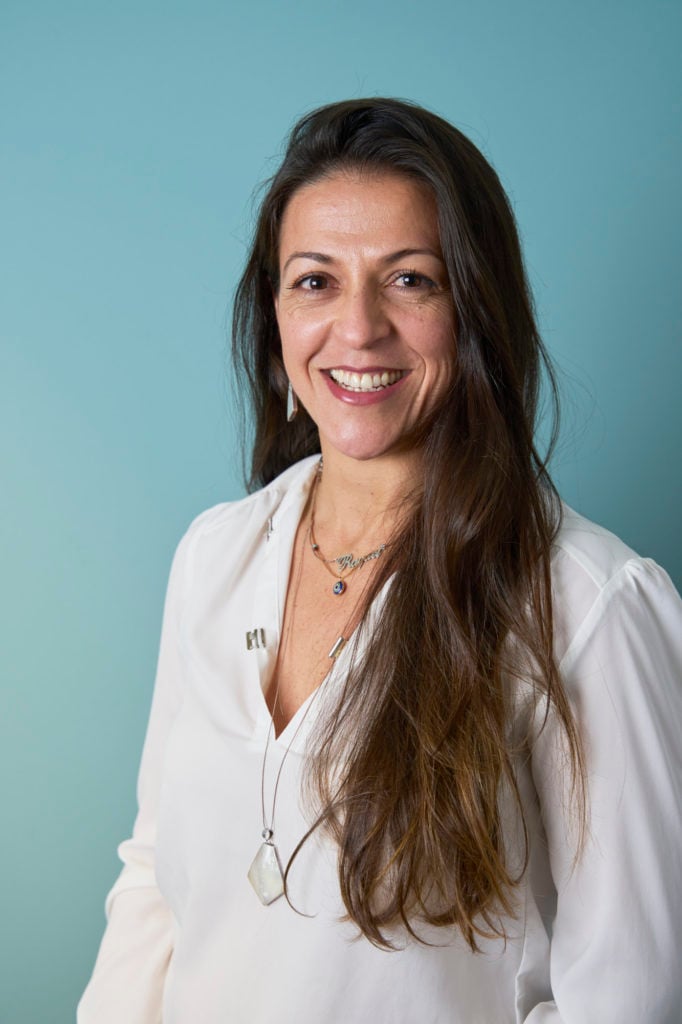 Studio-style headshot of a Pebbles team member