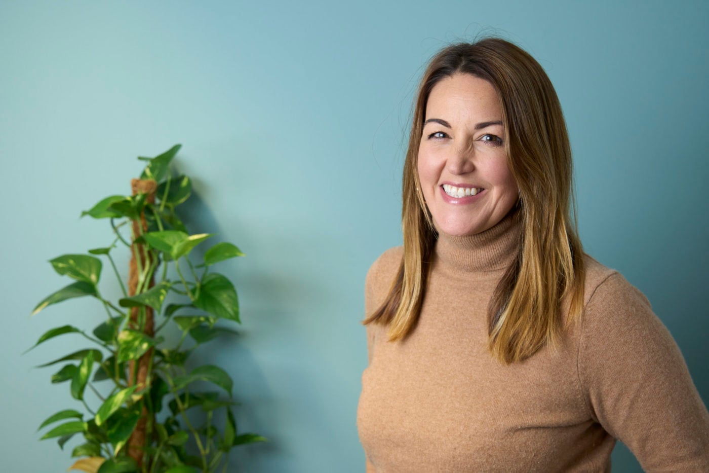 Studio-style headshot of a Pebbles team member