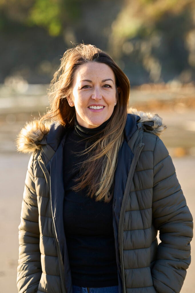 Portrait of a Pebbles team member on the beach