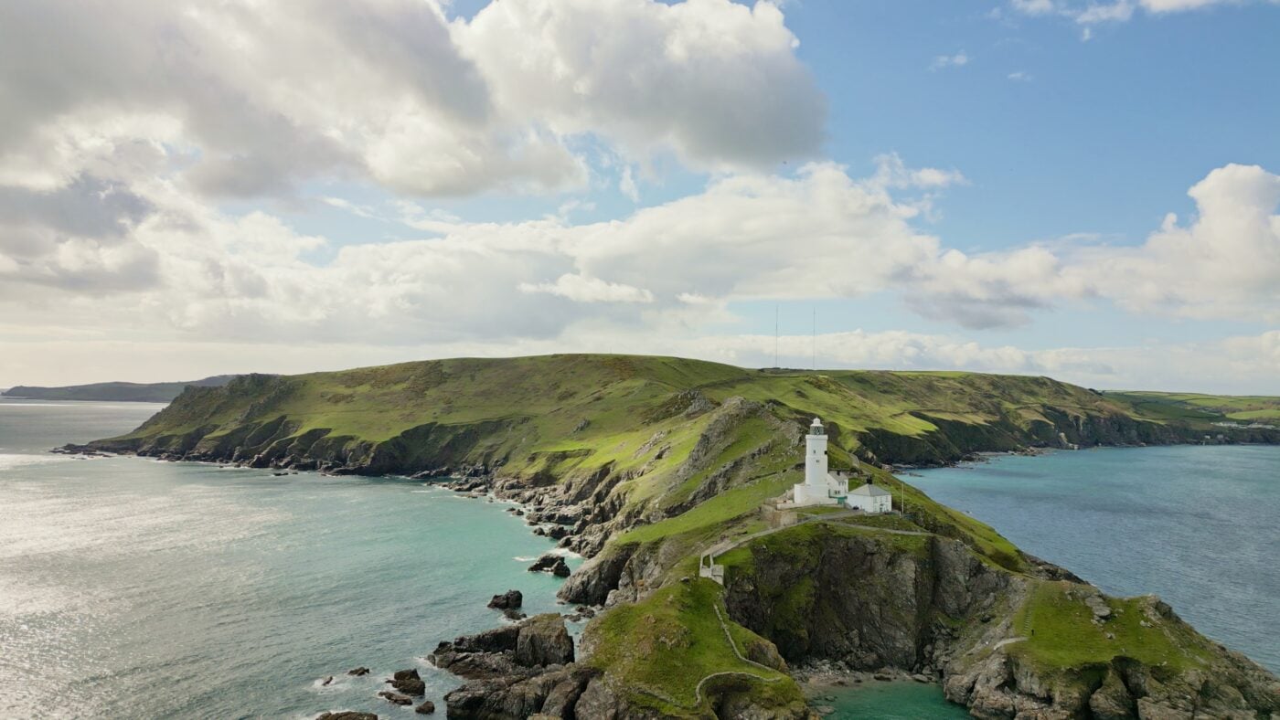 Drone filming a coastal property from above